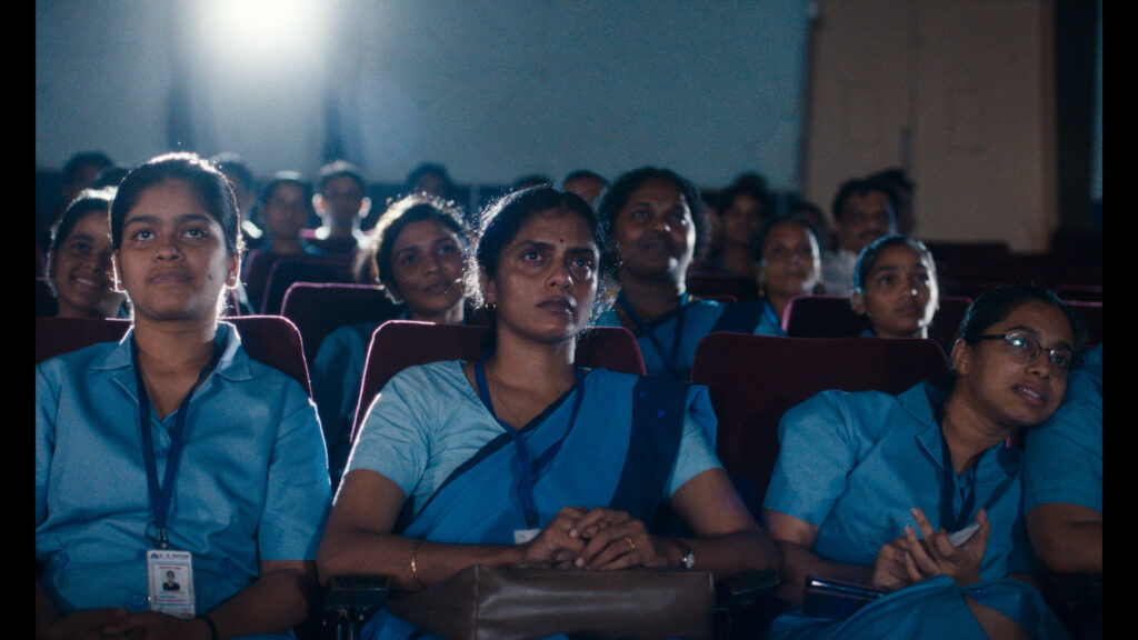 A still from All We Imagine As Light, starring Kani Kusruti (centre)